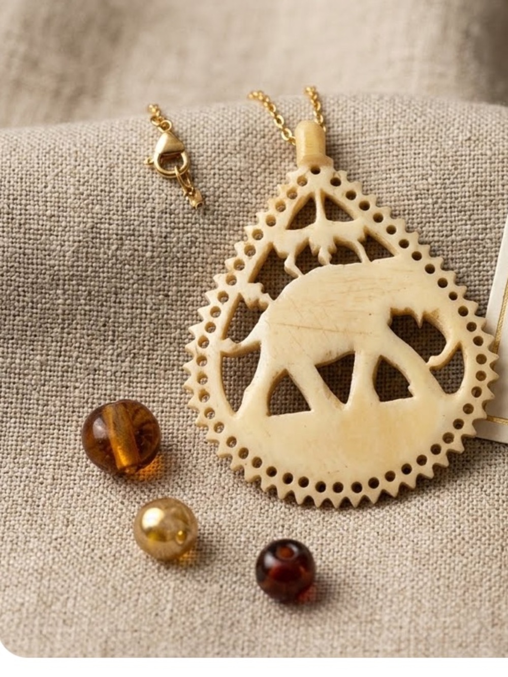 Hand-Carved Ivory Tone Elephant Pendant Necklace